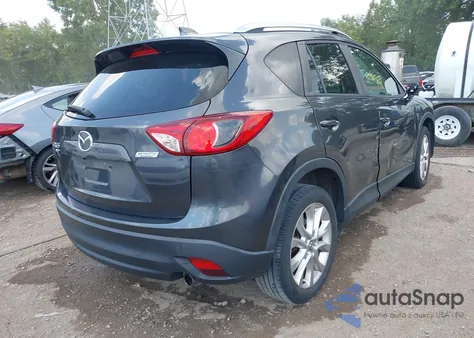 2015 Mazda Cx-5 Grand Touring z USA, uszkodzony, nr VIN JM3KE4DY0F0494958